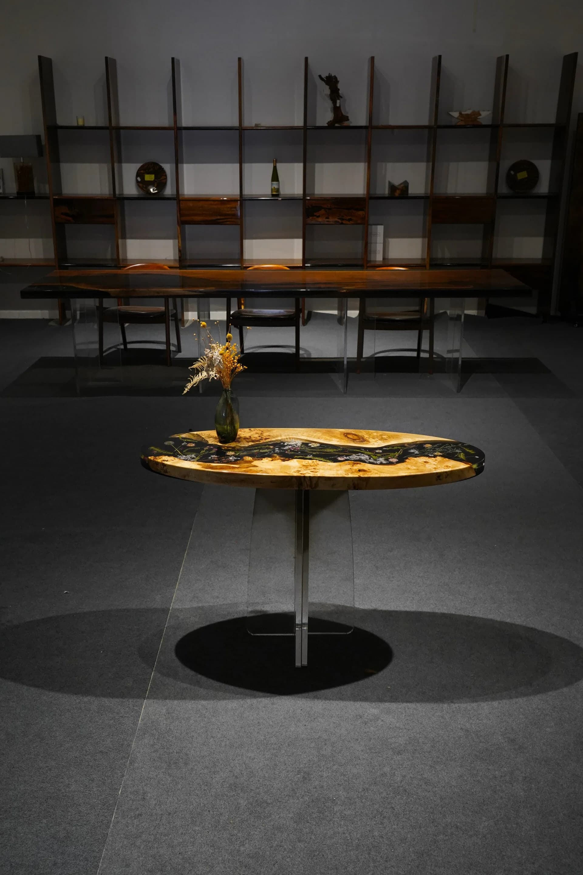 Petal Cascade oval table in fir burl, natural flowers, and black resin, 120 by 50 centimetres